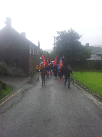 Marching through the village of Edale